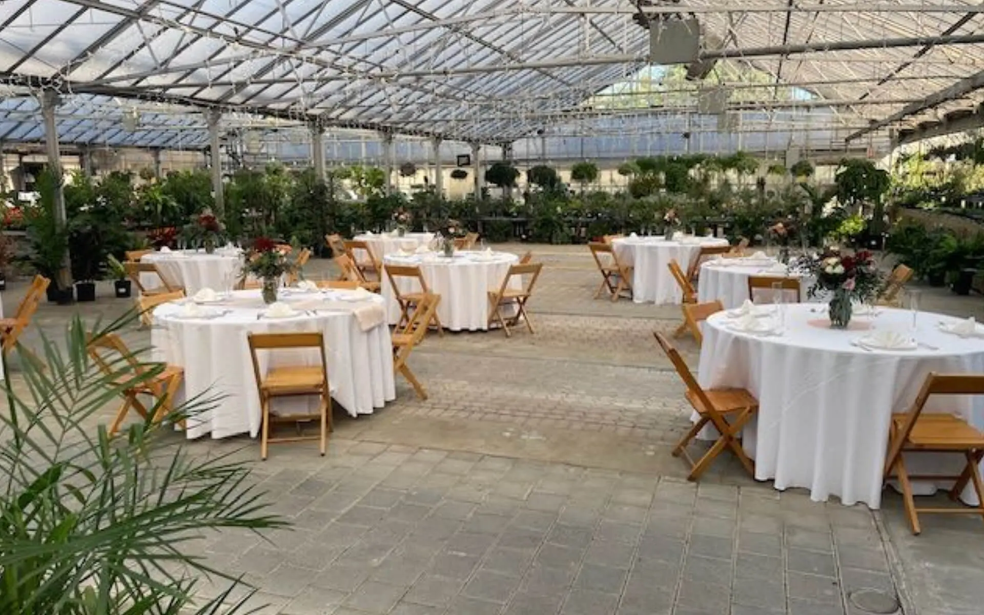 A large room with tables and chairs in it