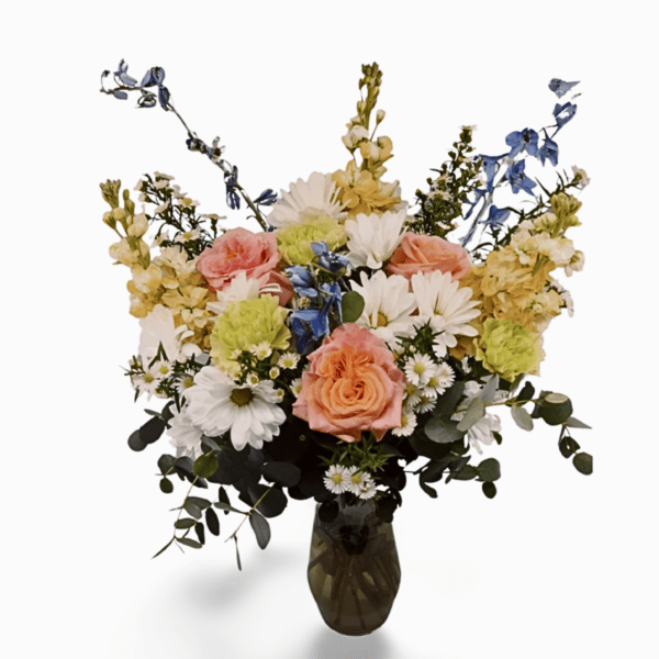 Pastel flower bouquet in vase.