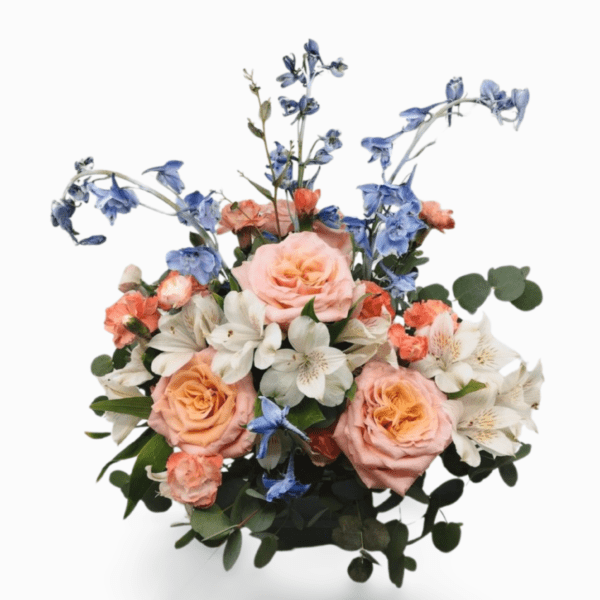 Peach and blue floral arrangement.