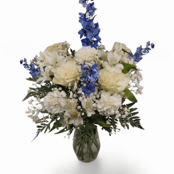 Blue and white flower arrangement in vase.