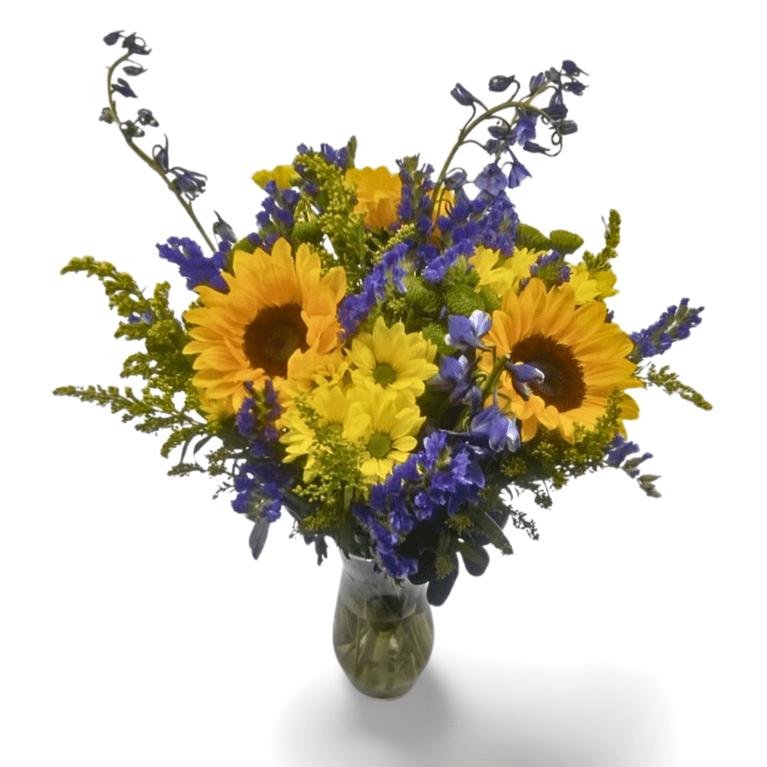 Sunflowers and delphiniums in a vase.